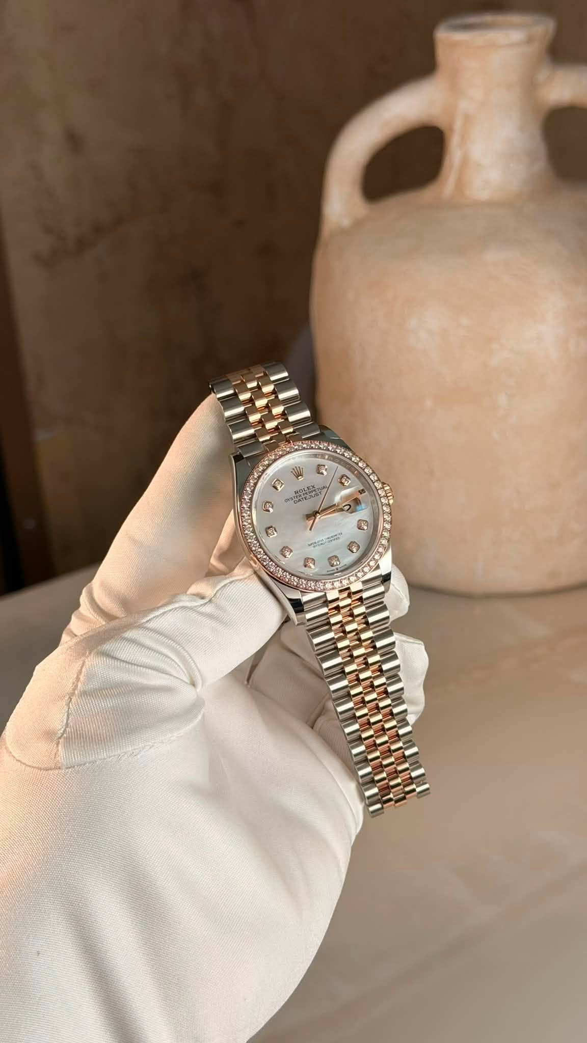 May be an image of wrist watch and text