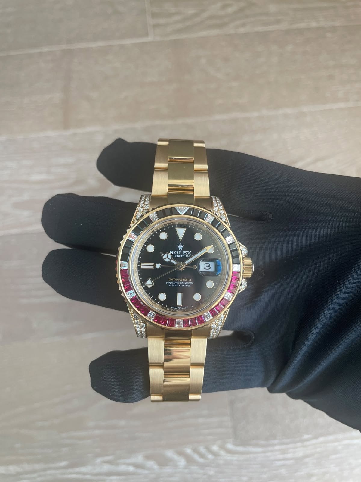 May be an image of wrist watch and text