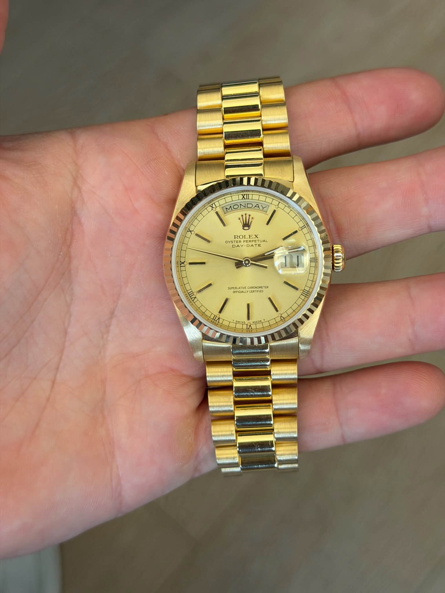 May be an image of wrist watch and text