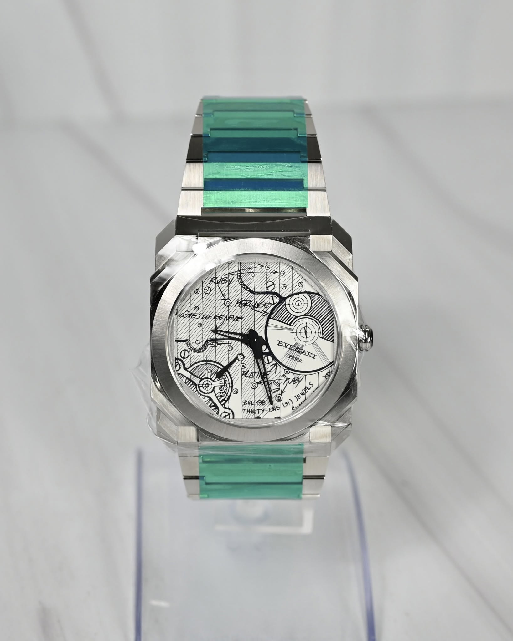 May be an image of wrist watch and text