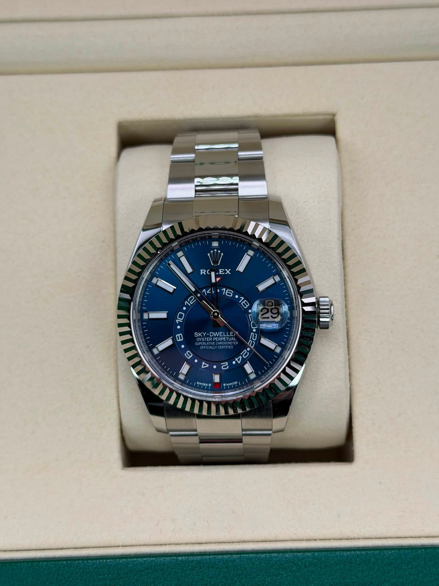 May be an image of wrist watch and text