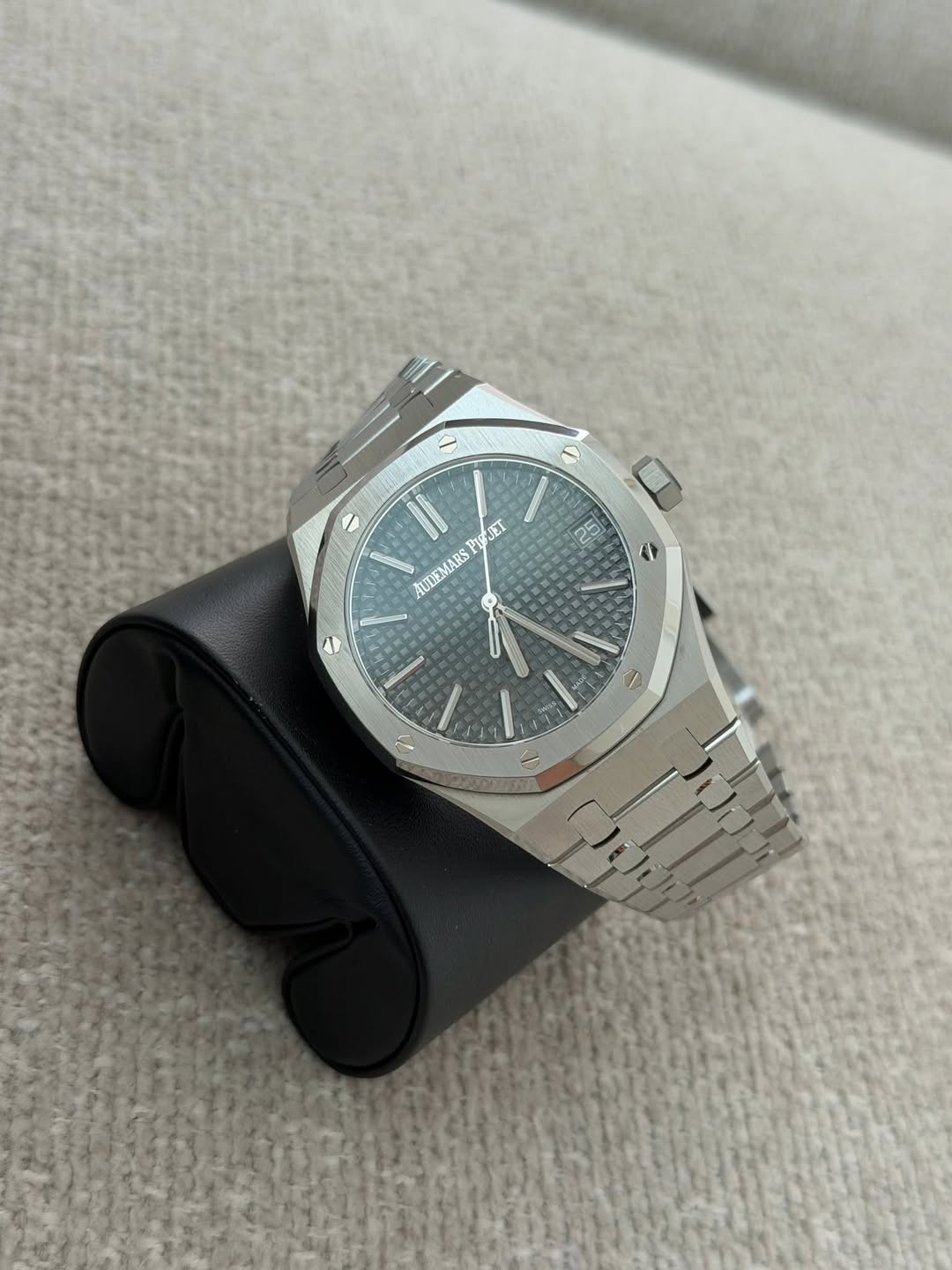May be an image of wrist watch and text