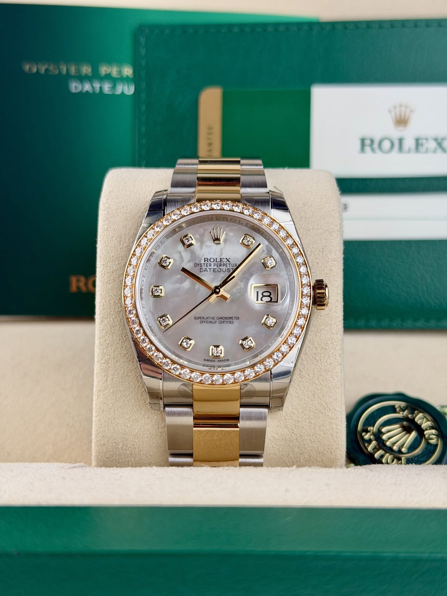 May be an image of wrist watch and text