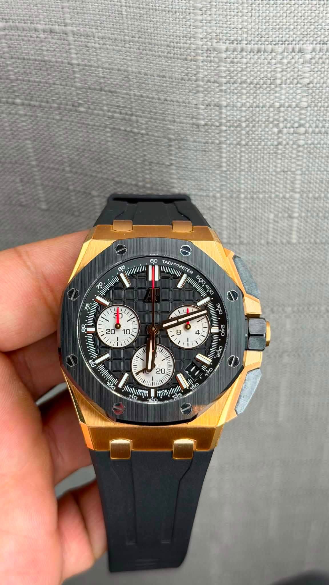 May be an image of wrist watch and text