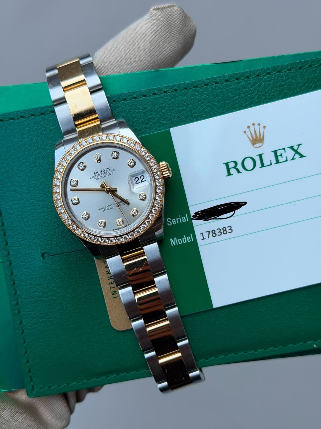 May be an image of wrist watch and text