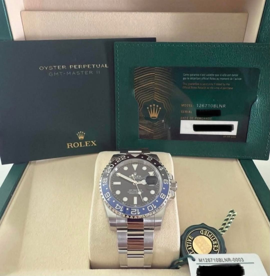 May be an image of wrist watch and text that says 'OYSTERPERPETUAL OYSTER PERPE TUAL 126710BLNR ROLEX 2 4 ALEX ባ Pa 6 31 8 O A CELHLL តសរជ្នៃ M126710BLNR-0003'