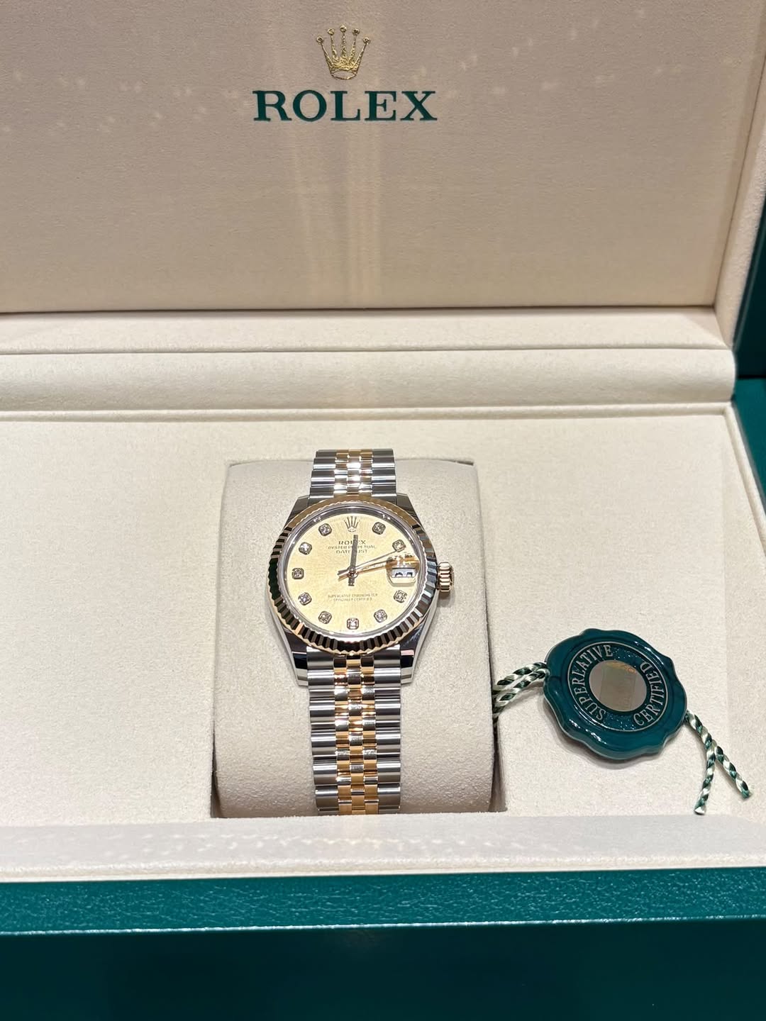 May be an image of wrist watch and text