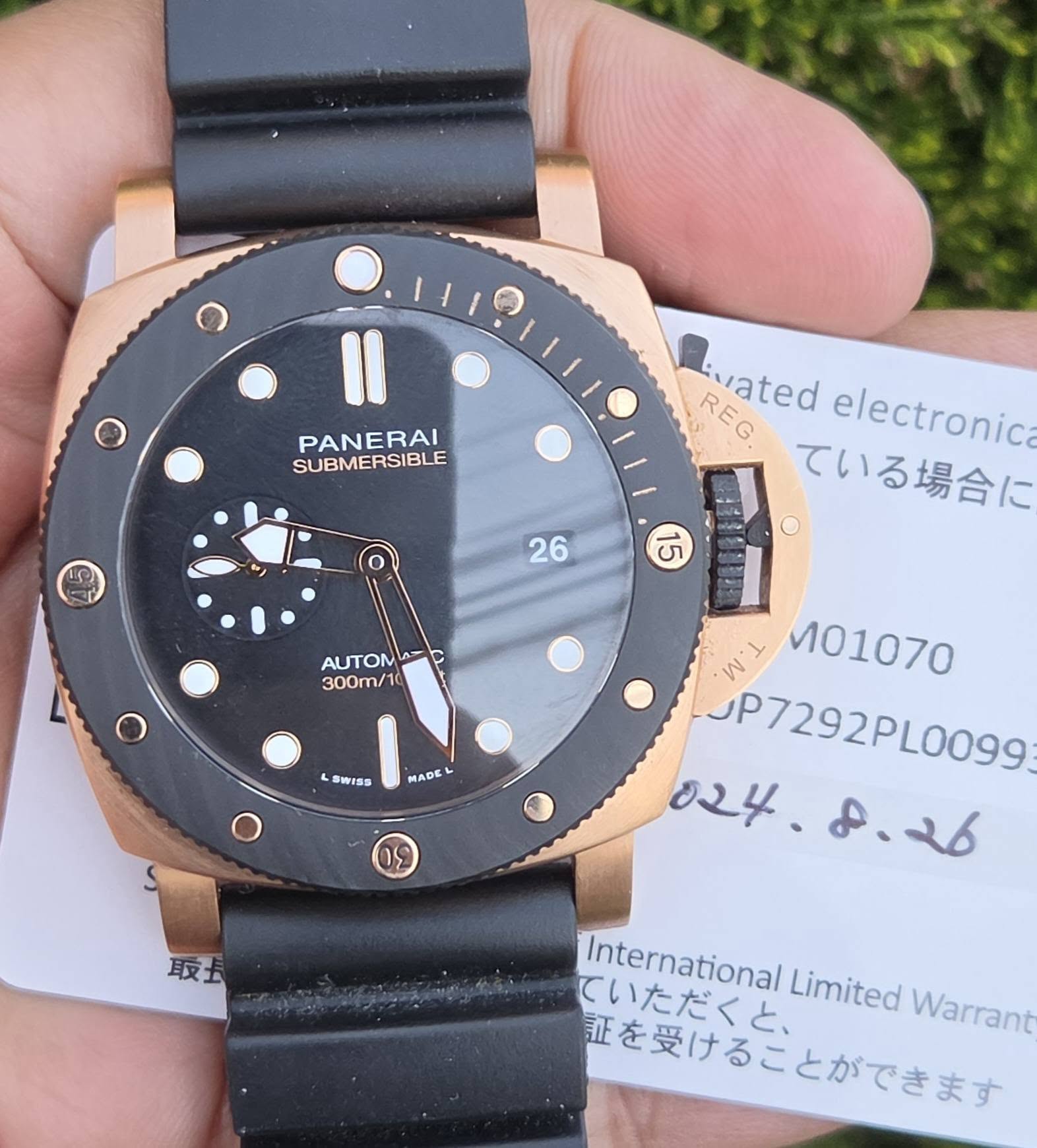 May be an image of digital watch and text that says 'PANERAI SUBMERSIBLE REG vated electronica ている場合に 26 15 AUTON 300m/10 0 ร MADE M01070 JP7292PL0099 024 م2.و 販士 ていただくと、…