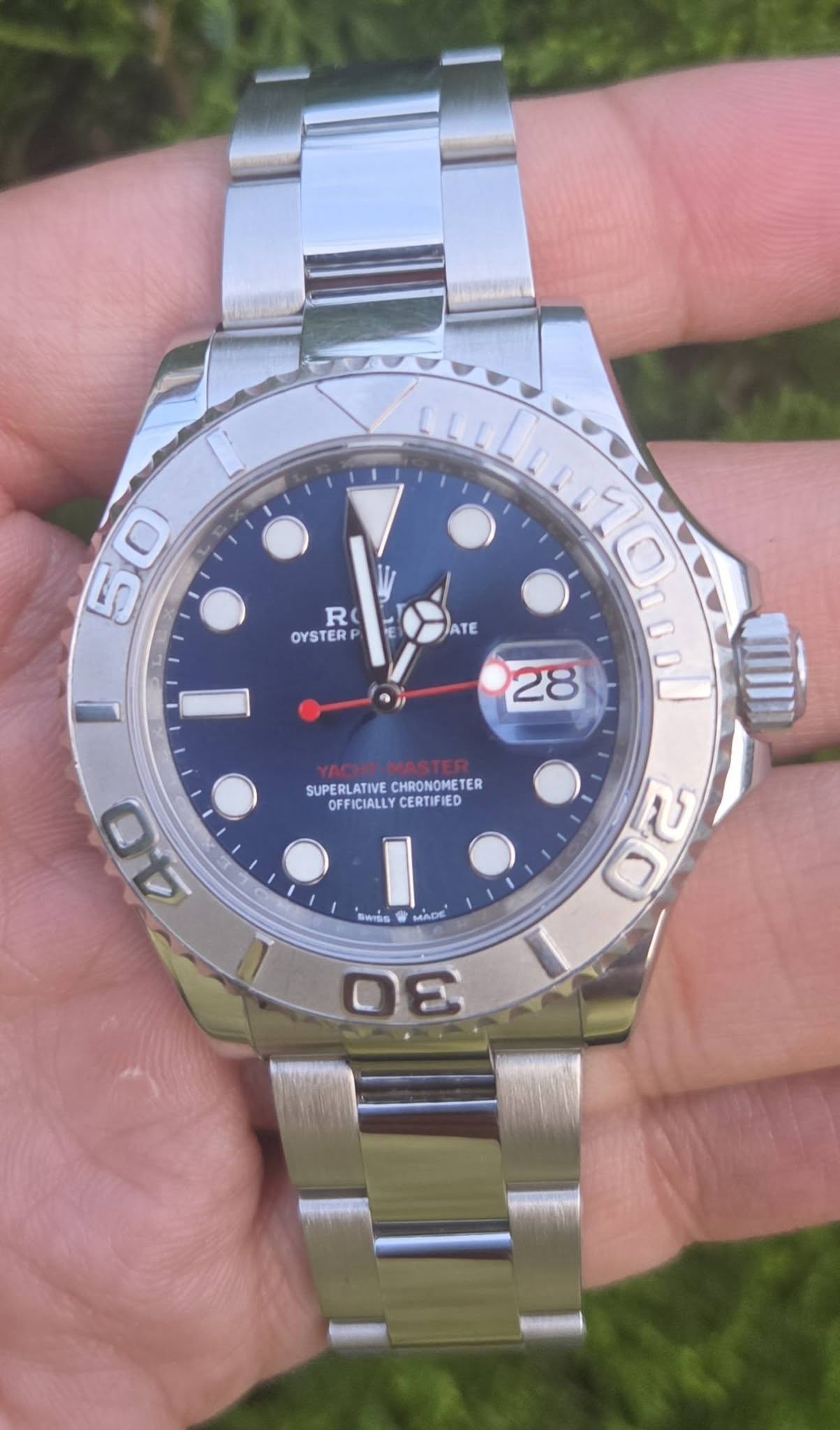 May be an image of wrist watch and text that says '50 5 R OYSTER ATE SUPERLATIVE OFFICIALLYCERTIFIED OFFICIALLY CHRONOMETER SUPERLATIVECHRONOMETER TER 10 0 28 4Orcol 00l UI 9 20 40…