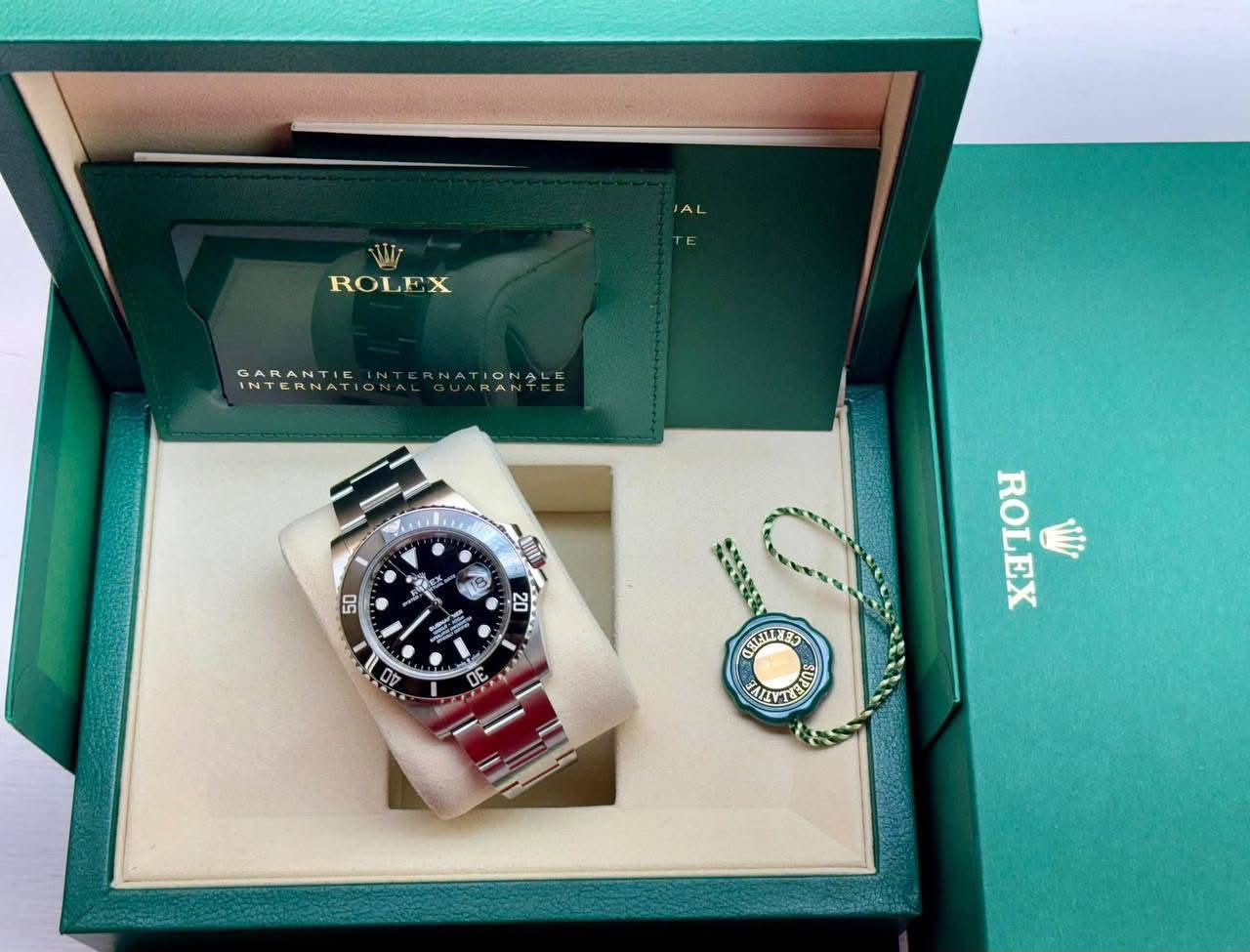 May be an image of wrist watch and text that says 'JAL WI ROLEX GARANTIE INTERNATIONTERNATIONALE INTERNAT IONALE min さ M 50 ထ 20 07 B Με UE ROLEX t GELEILNES ZAALET AIVTE -'