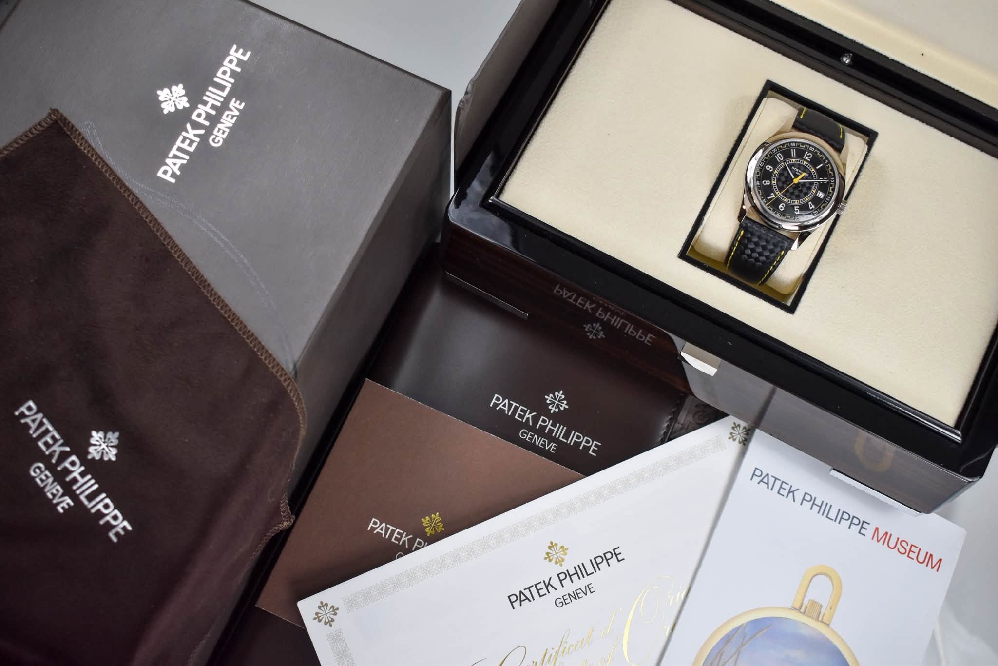 May be an image of wrist watch and text that says 'PHILPPE EKPHILIPPE PW GENEVE PATEK 10 0 9 OK PATEKPHILIPPE PAP の焼 PATEKPHILIPPE ឲូបាភ GENEVE 只海 PASE 樂 PATEK GENEVE…