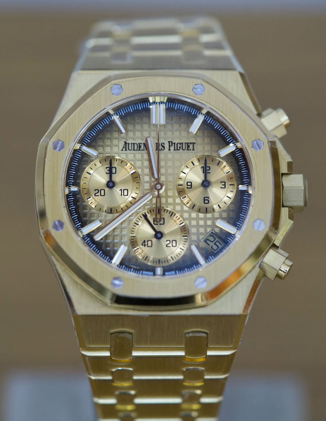 May be an image of wrist watch and text
