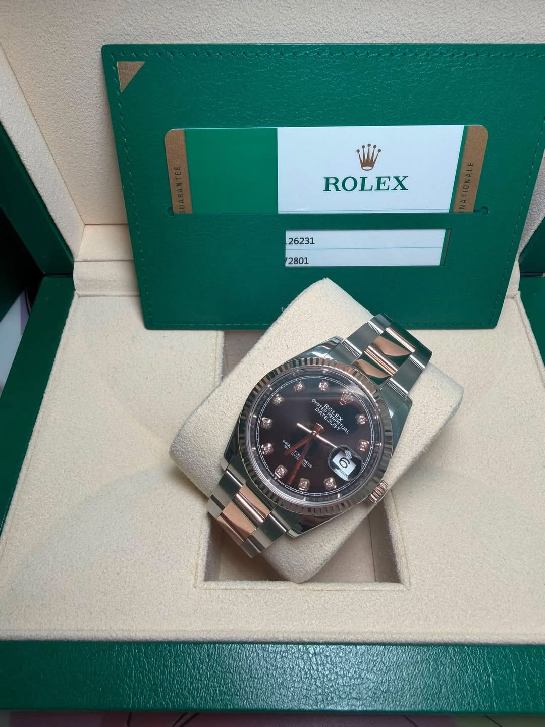 May be an image of wrist watch and text