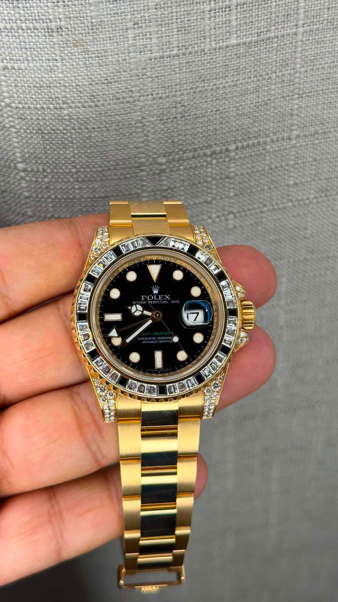 May be an image of wrist watch and text