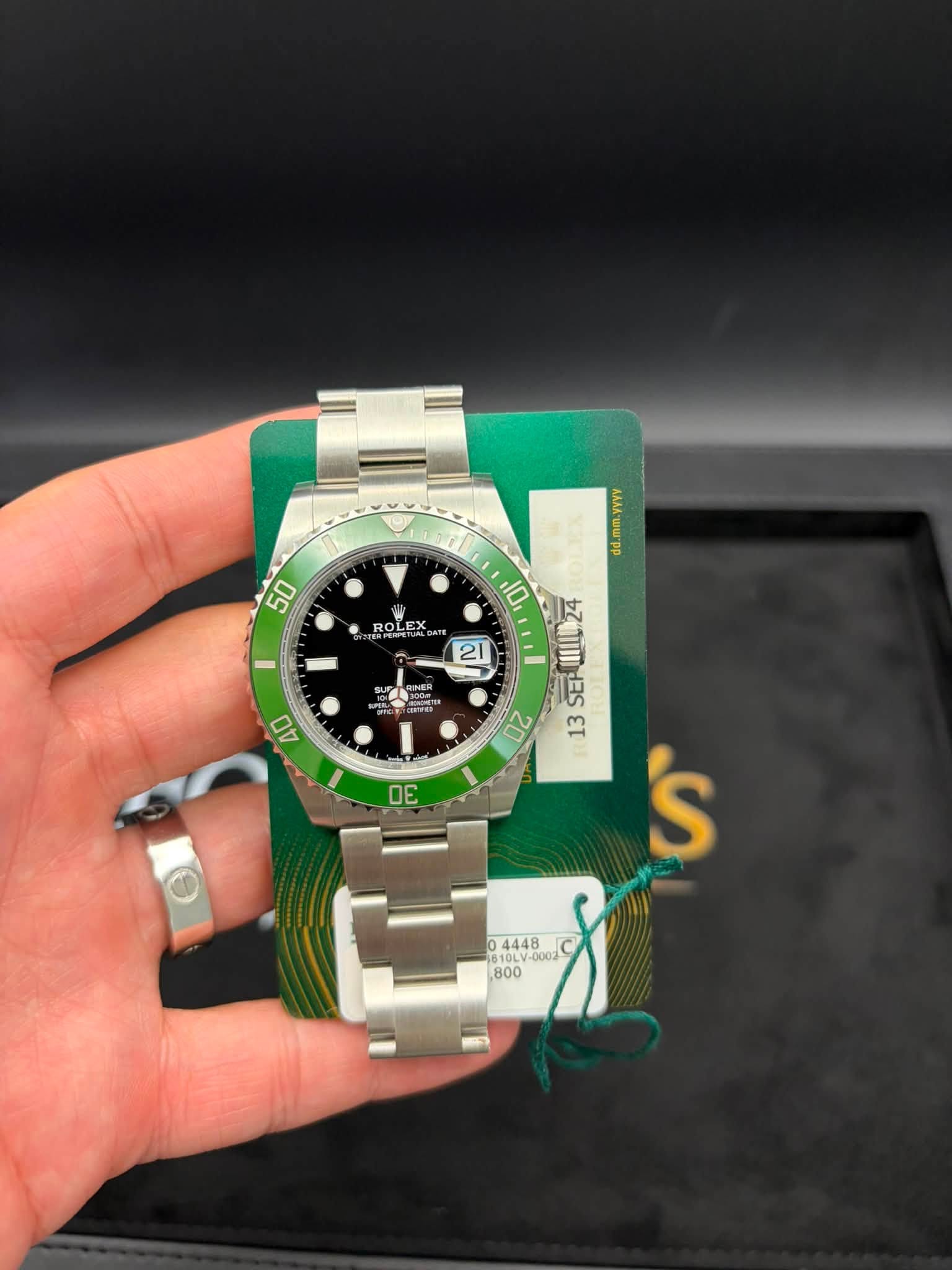 May be an image of wrist watch and text that says 'YYYY nm.ynwy 50 ROLE ROLEX X 21 300m 40 10 흐로까 20 ST 43 દા 'S '