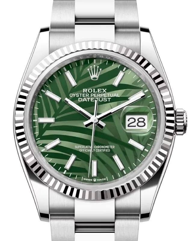 May be an image of wrist watch and text that says 'W ROLEX OYSTER OYSTERPERP PERPETUAL DATEJUST 28 SUPERLATIV SUPERLATIM.CHRONOMETER CHRONOMETER OFFICIA OFFICIALYCERTIFIED Y…