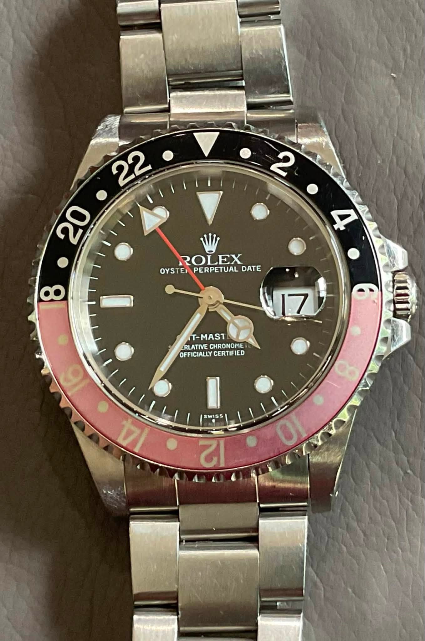 May be an image of wrist watch and text that says ' WI ROLEX OYSTE OYSTEAPERPETUALDATE PERPETUAL DATE 17 IT-MAST ERLATIVE CHRONOME OFFICIALLY CERTIFIE யப 6 8 SWISS 4 0 12'