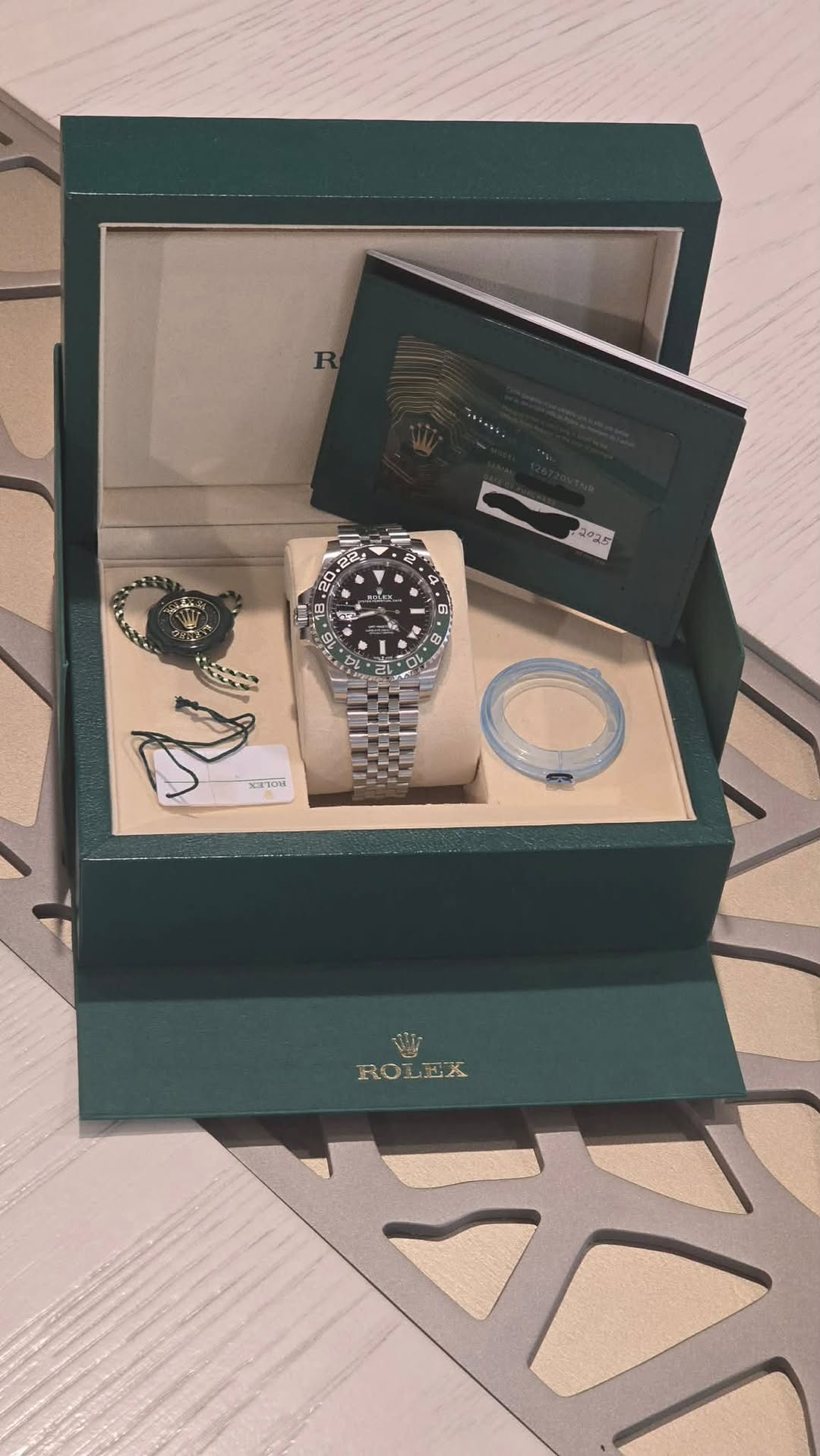 May be an image of wrist watch and text