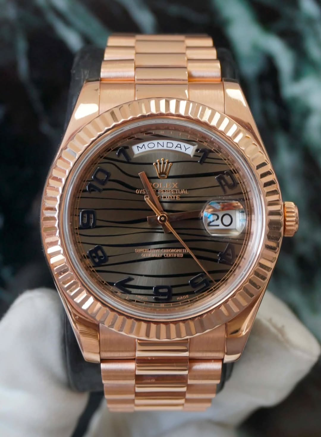 May be an image of wrist watch and text