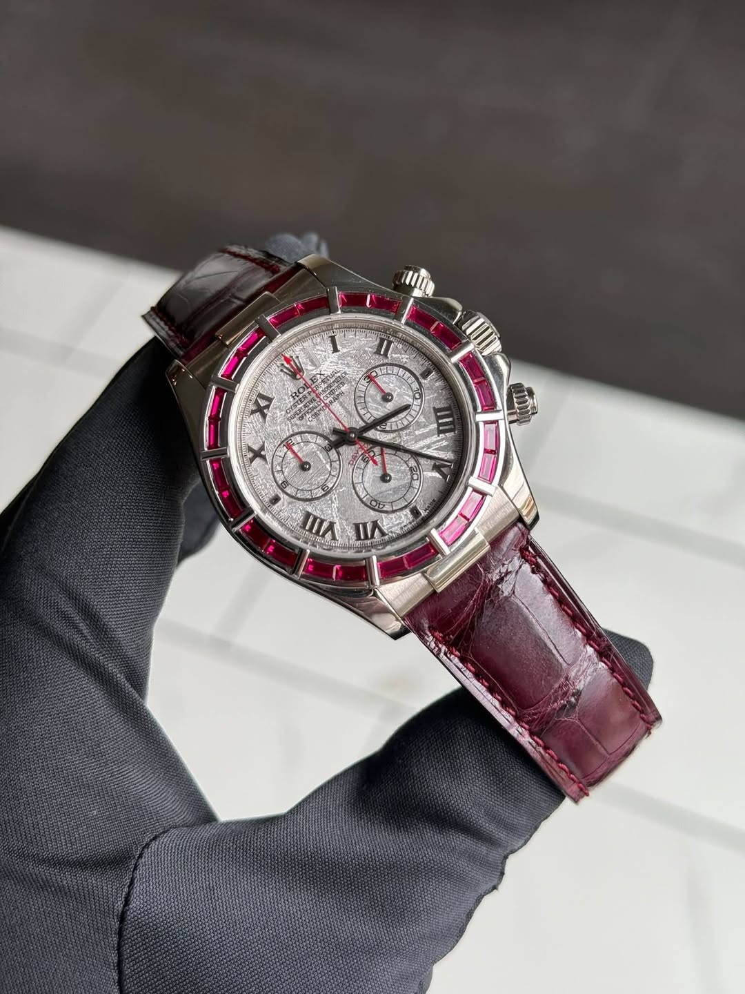 May be an image of wrist watch and text