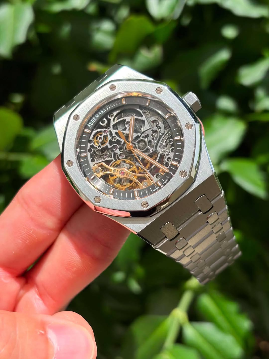 May be an image of wrist watch and text