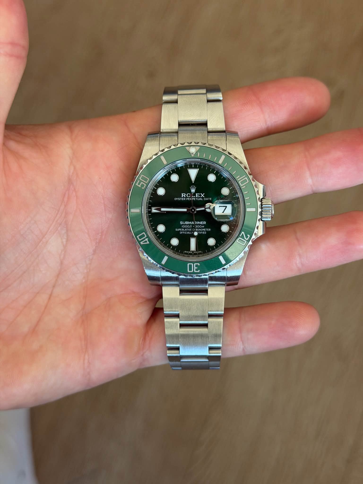 May be an image of wrist watch and text that says '50 RC RCLEX EX I 7 7 SUBMA UBMARINER INER 10 பற 20 40 DE'