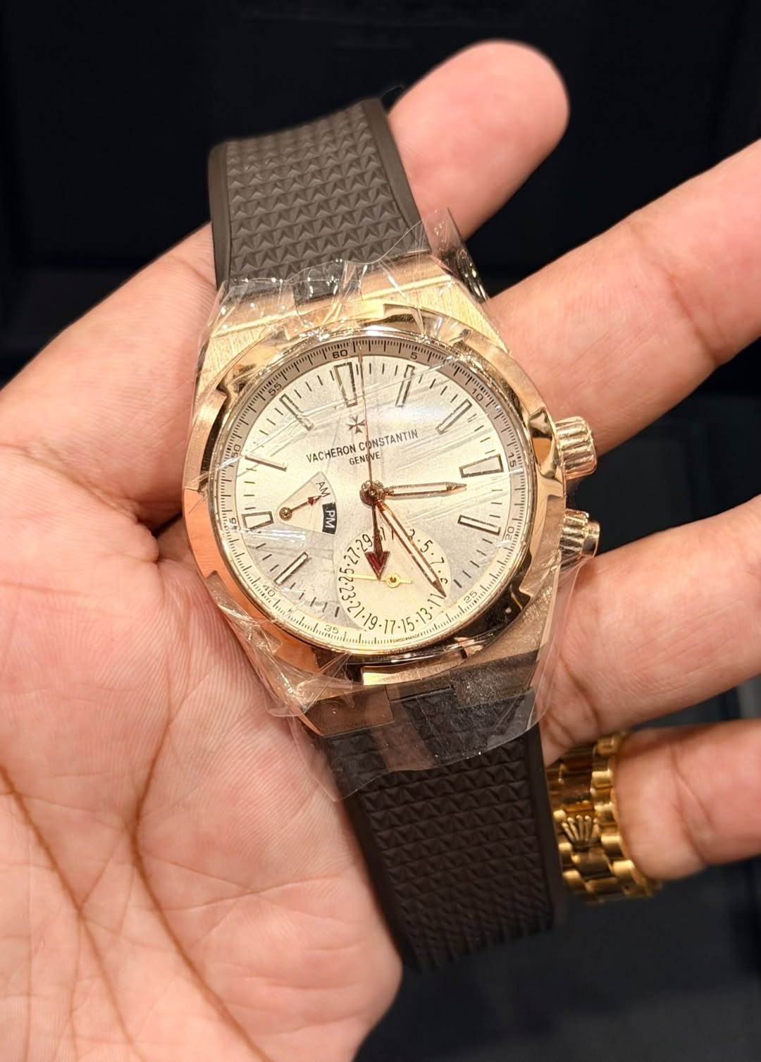 May be an image of wrist watch and text