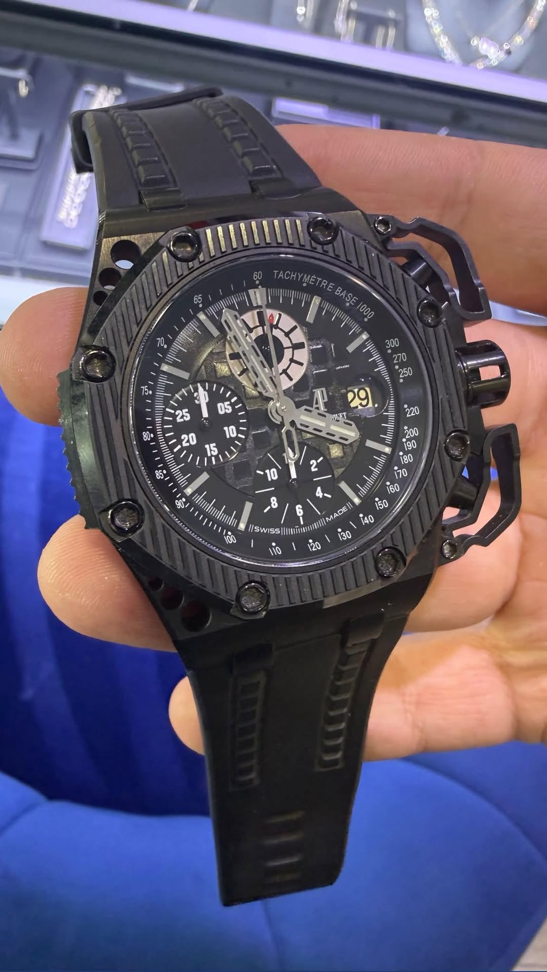 May be an image of wrist watch and text