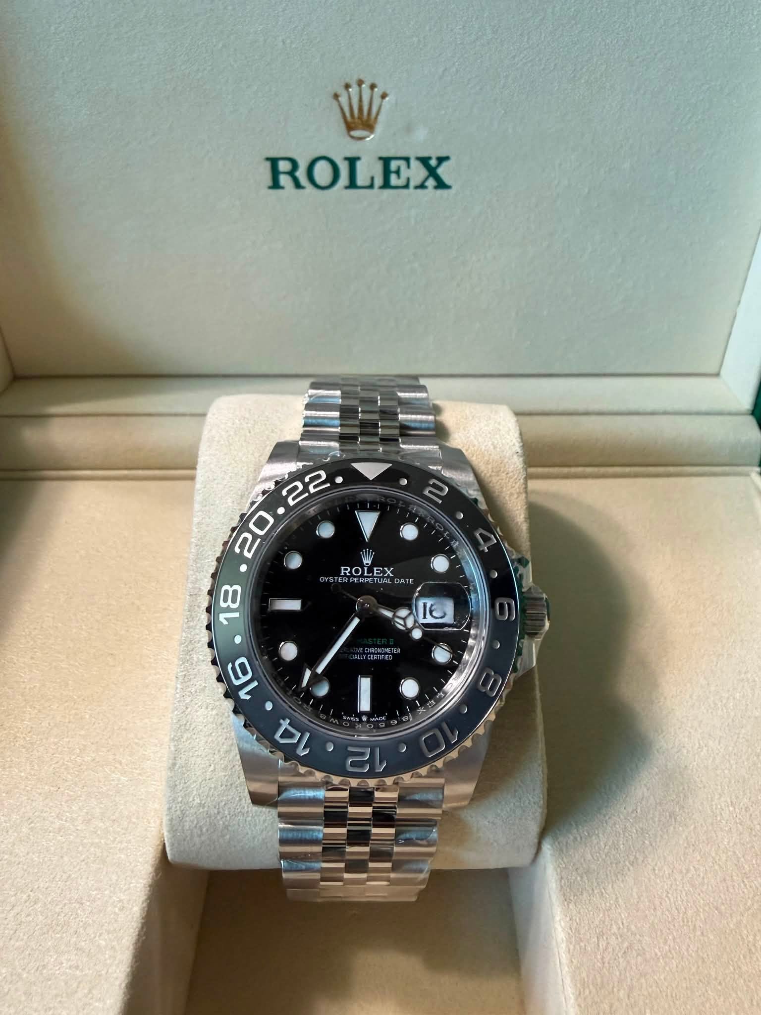 May be an image of wrist watch and text that says 'ROLEX ROLEX X ROI EX '