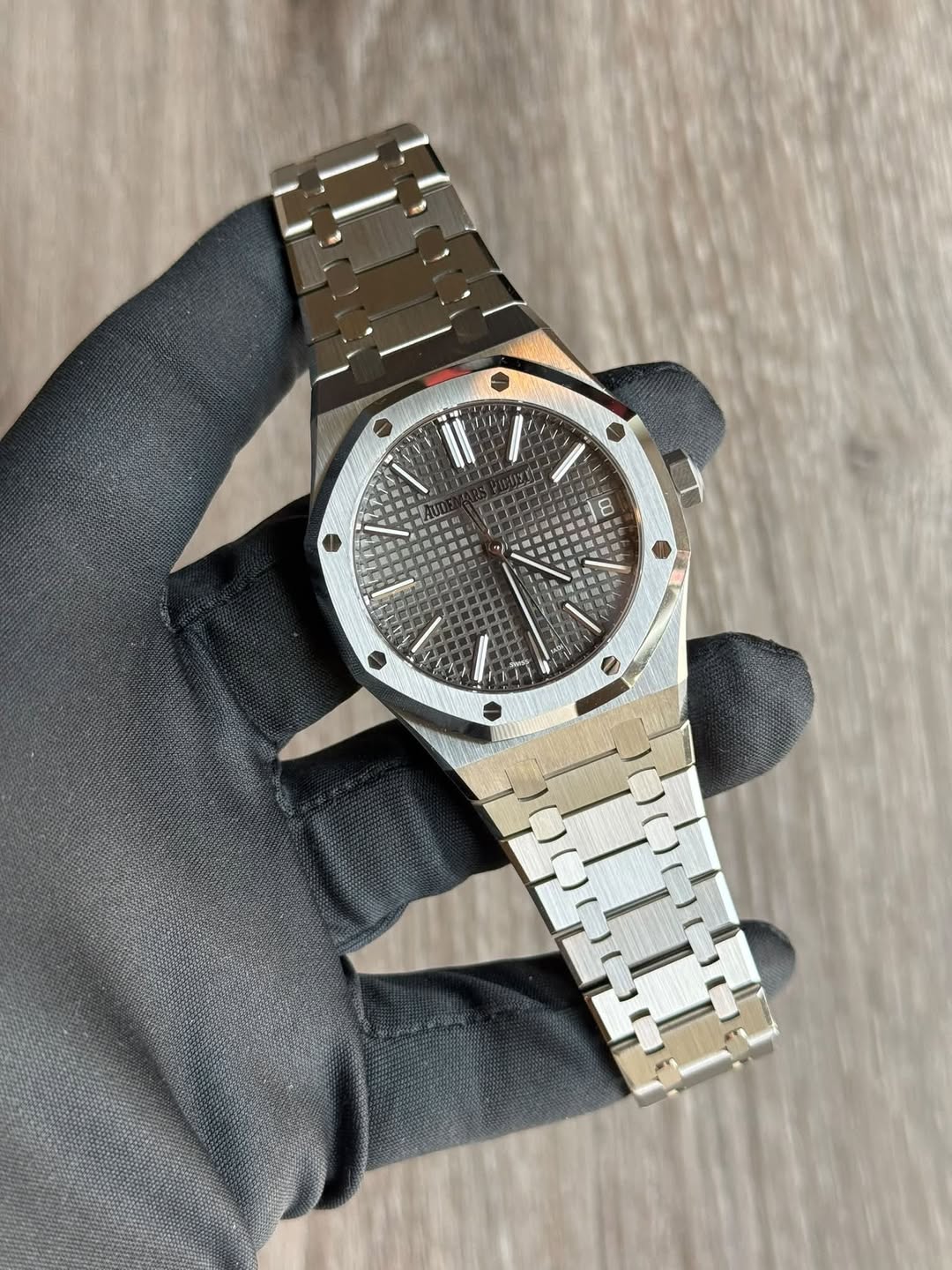 May be an image of wrist watch and text
