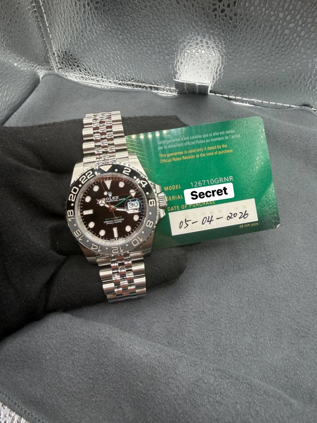 May be an image of wrist watch and text