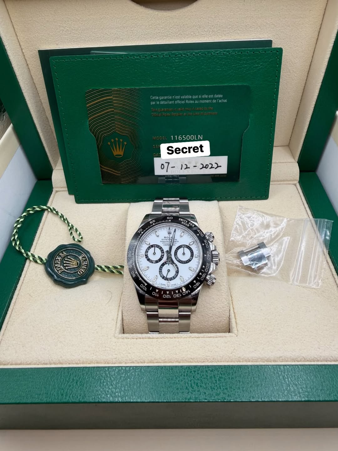 May be an image of wrist watch and text