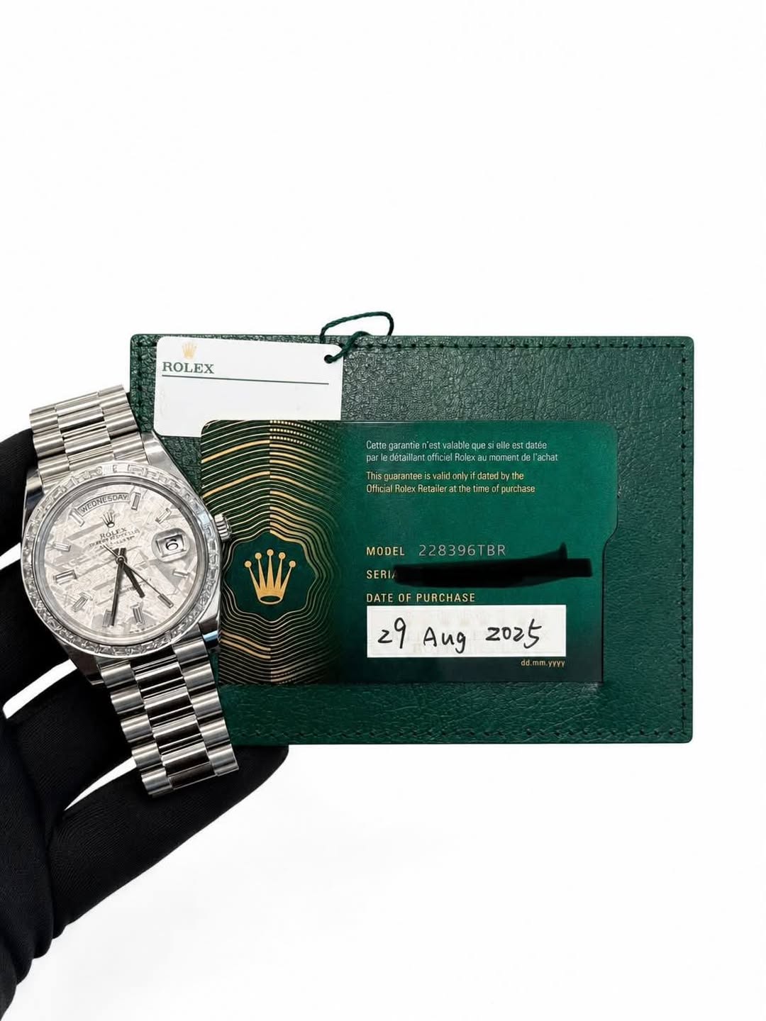 May be an image of wrist watch and text