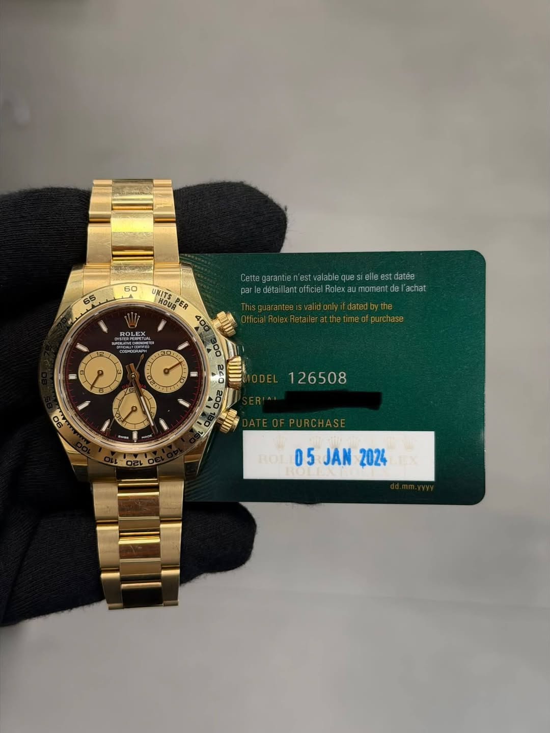 May be an image of wrist watch and text