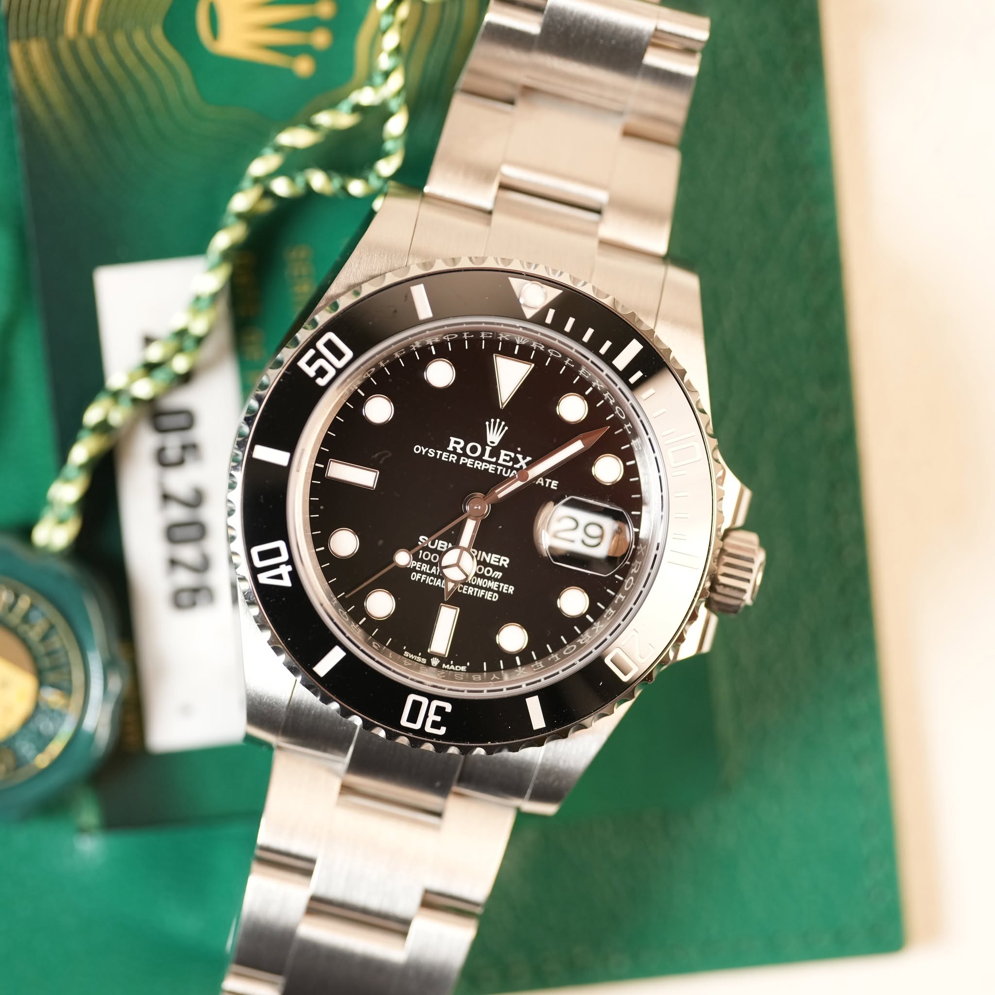May be an image of wrist watch and text