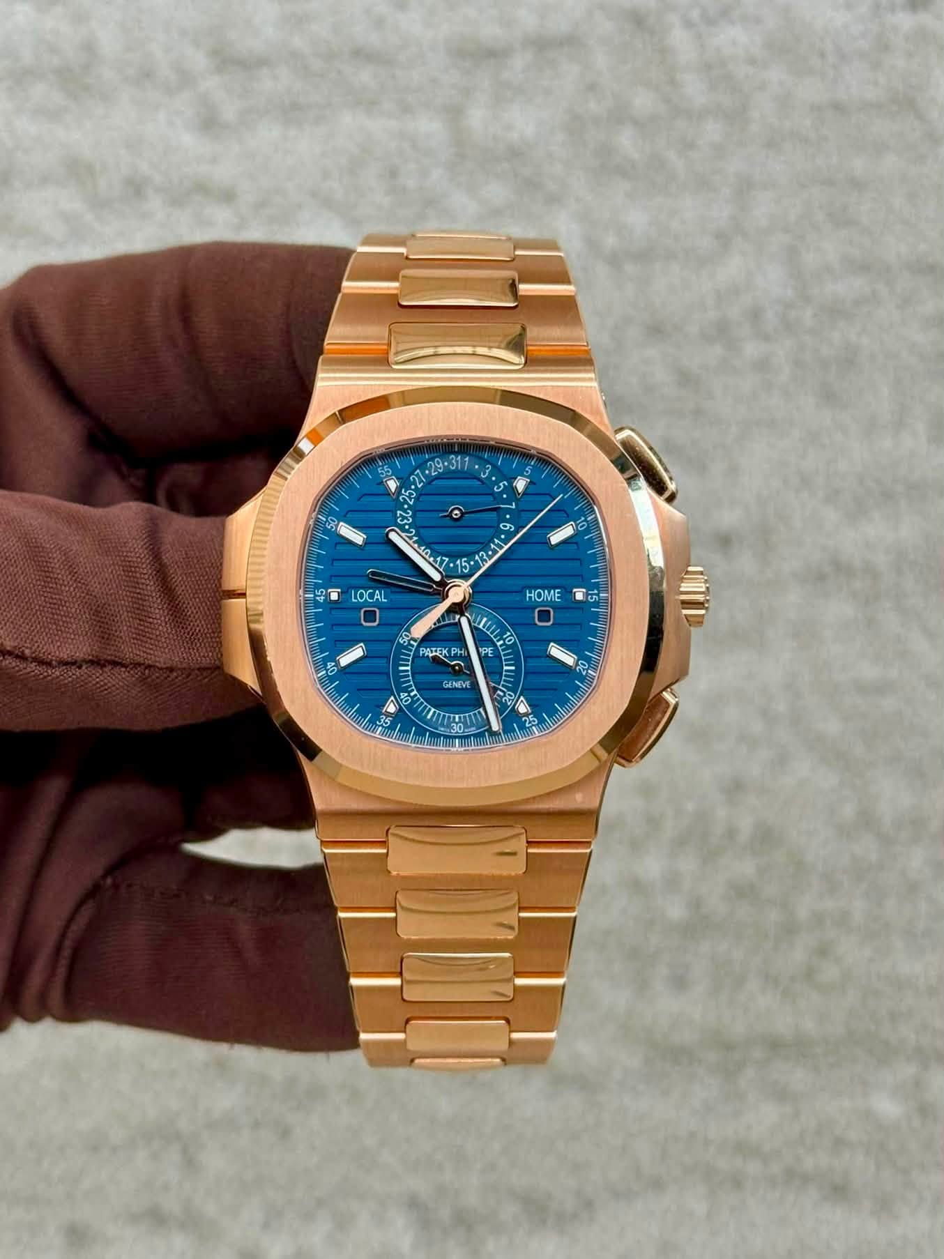 May be an image of wrist watch and text that says '5-2 < 7 o 10-17 15+ 7 LOCAL HOME T 5 ክ. S PATEKP GENDVE ብርያ 2 o V 1 ब્વ A 0 25 22'
