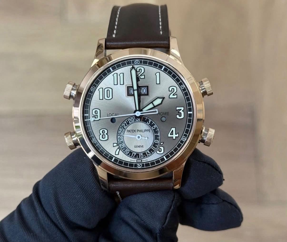 May be an image of wrist watch and text that says ' LOCAL 3 29 2ត PATEK ان PATEKPHILIPPE PATEKPHILUPPE ILIPPE G GENEVE 19 1 5 5 1ss まへ'