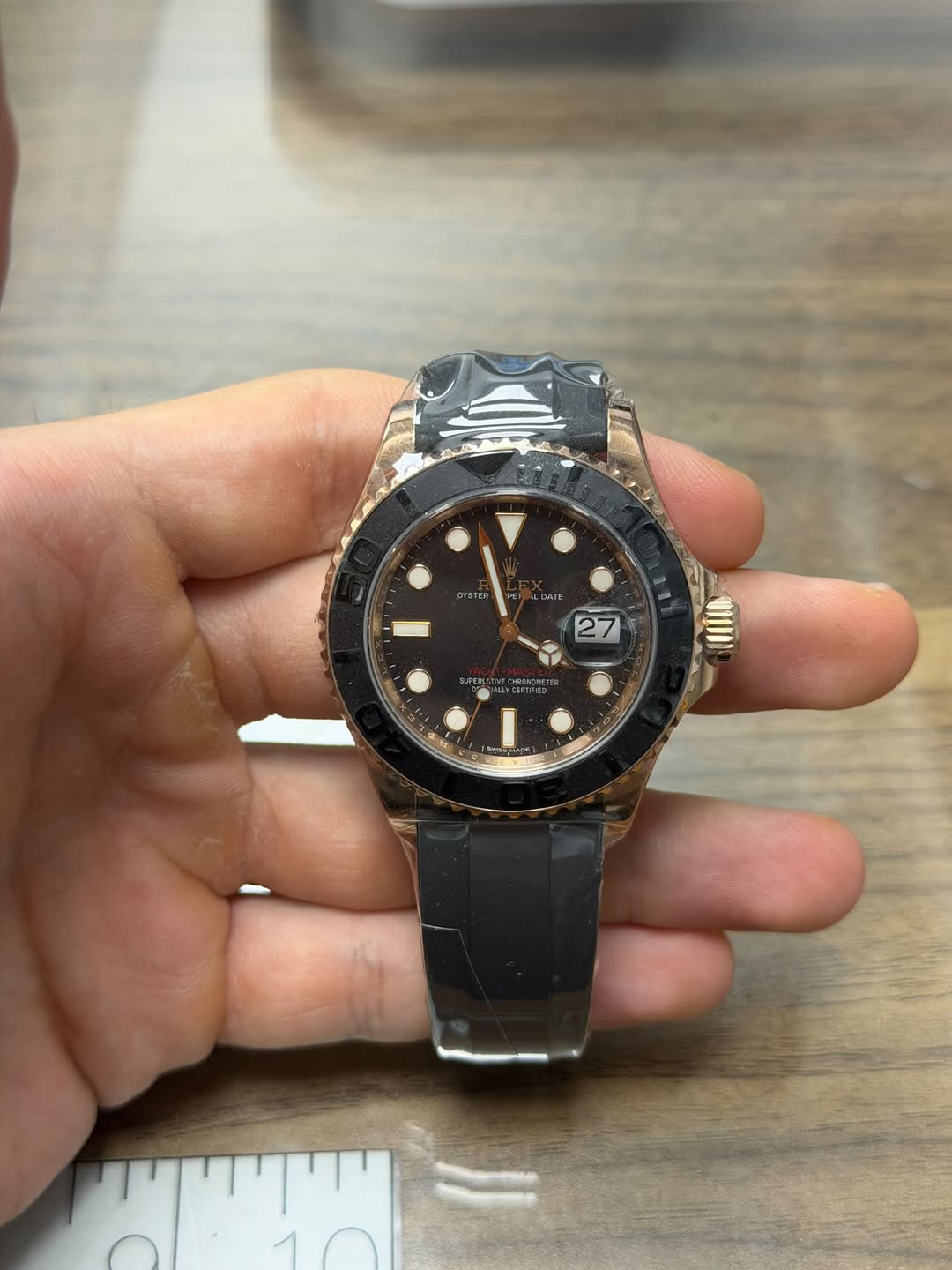 May be an image of wrist watch and text