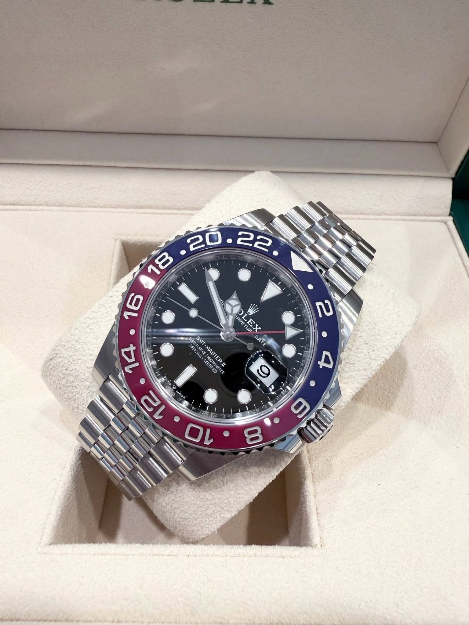 May be an image of wrist watch and text