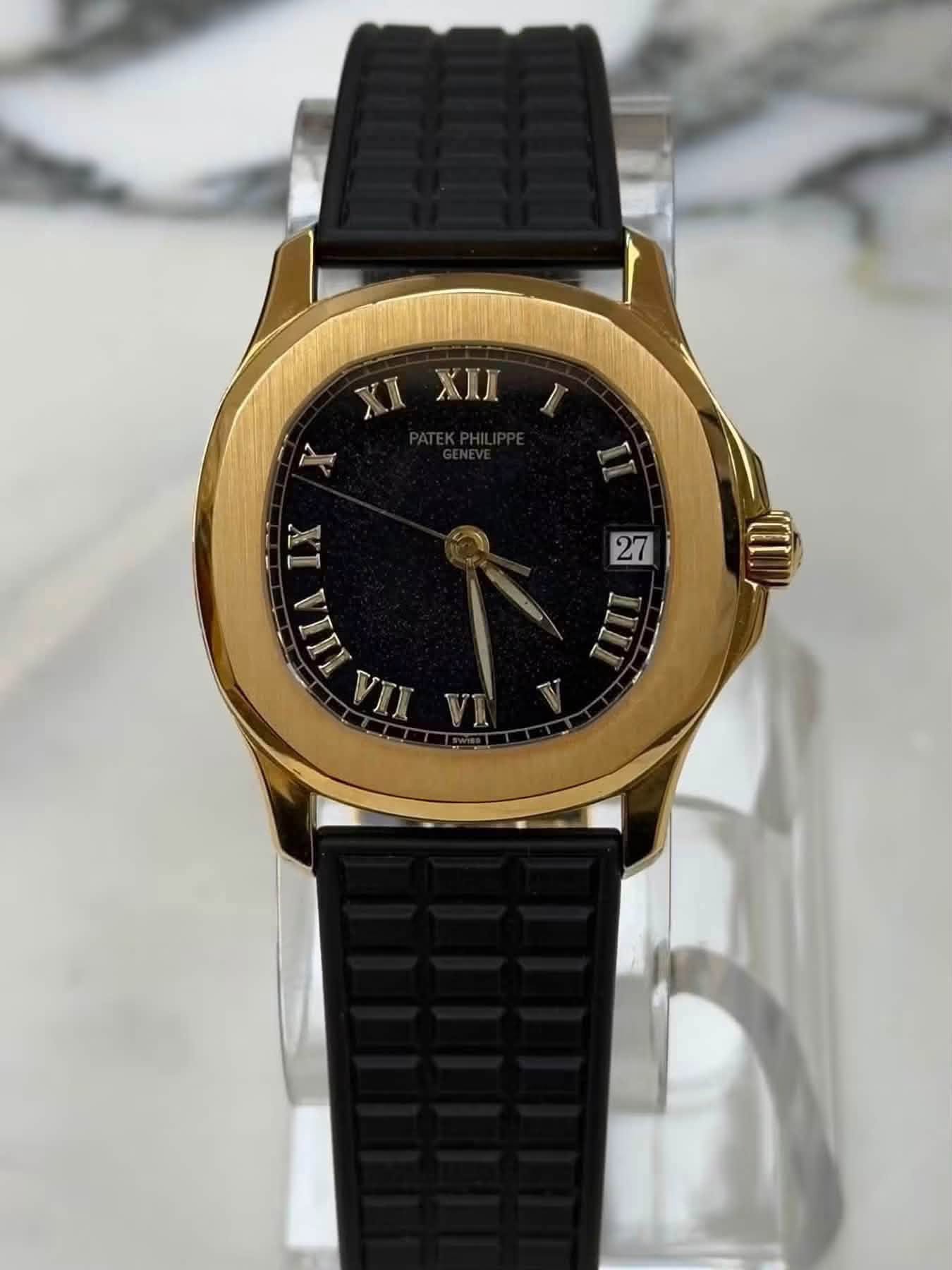 May be an image of wrist watch and text that says 'I XI XII C X IX VIII VII 27'