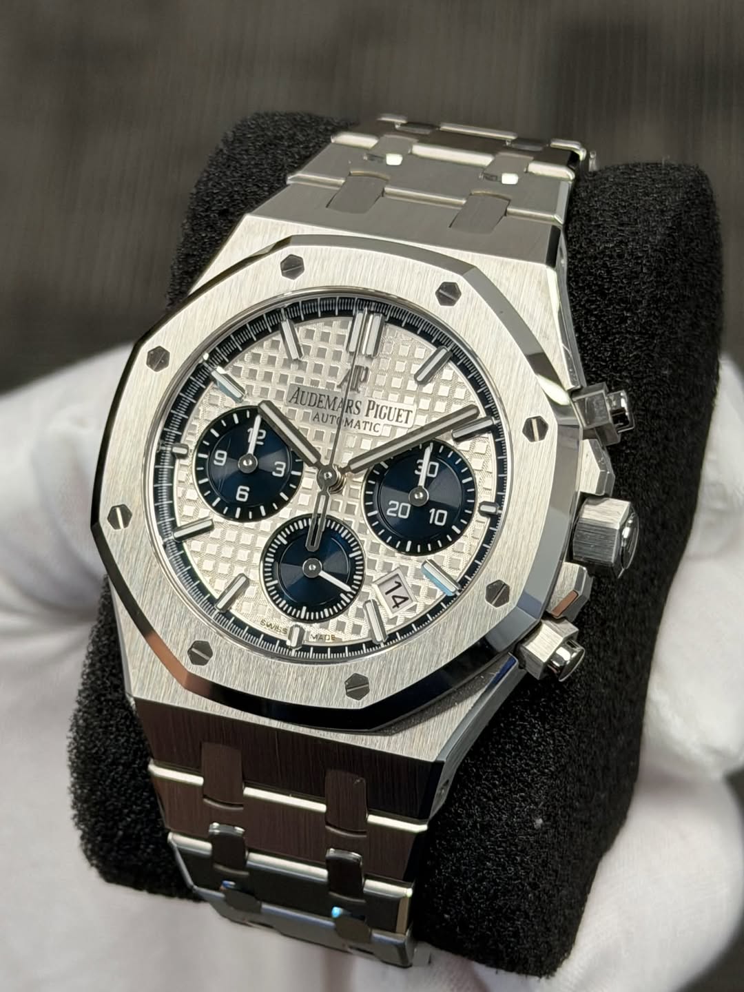 May be an image of wrist watch and text