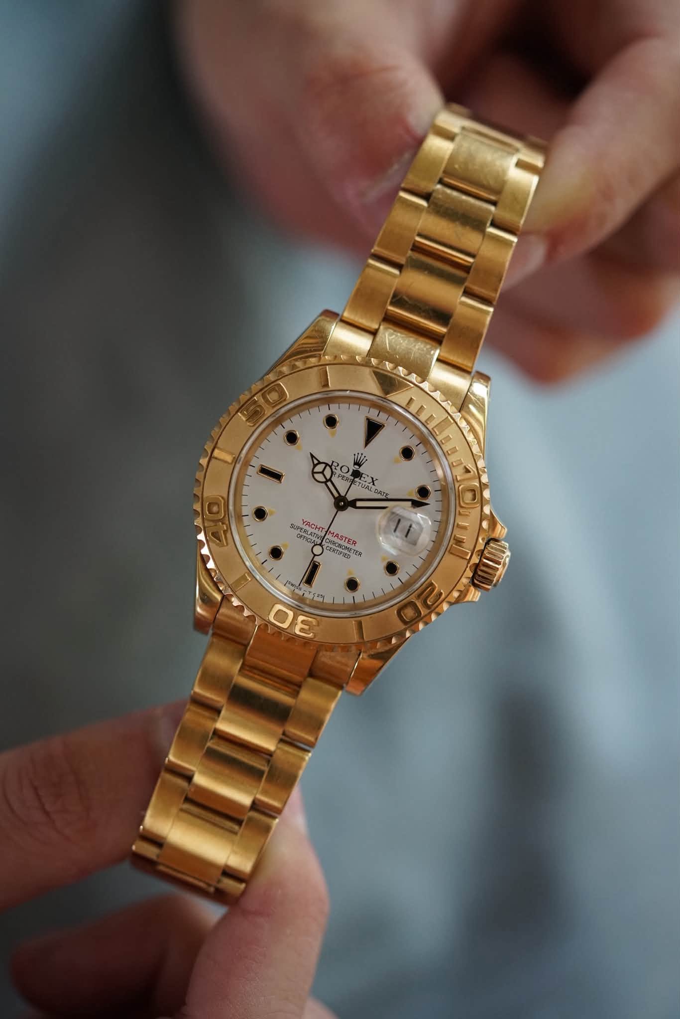 May be an image of wrist watch and text