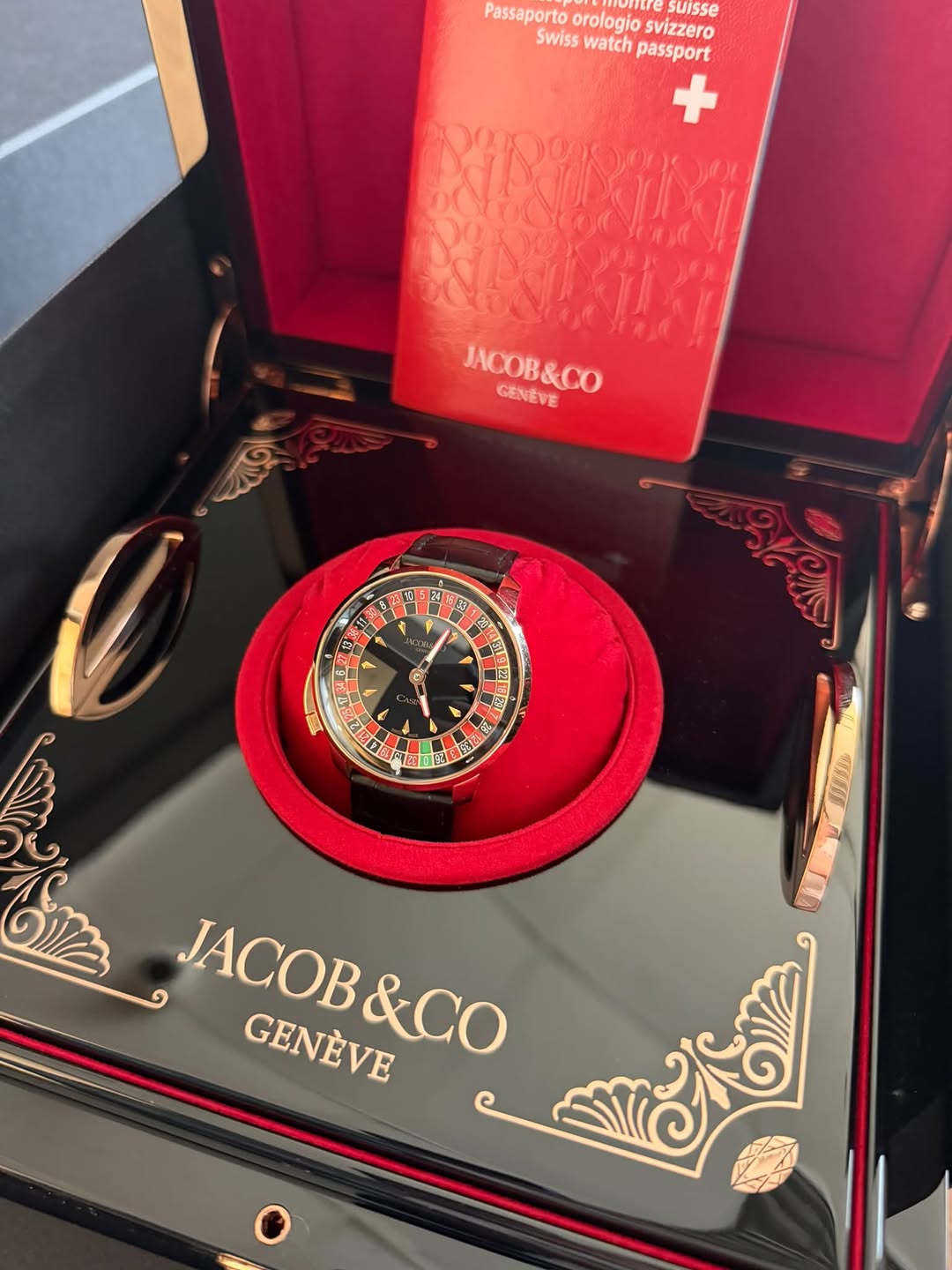 May be an image of wrist watch, fragrance and text
