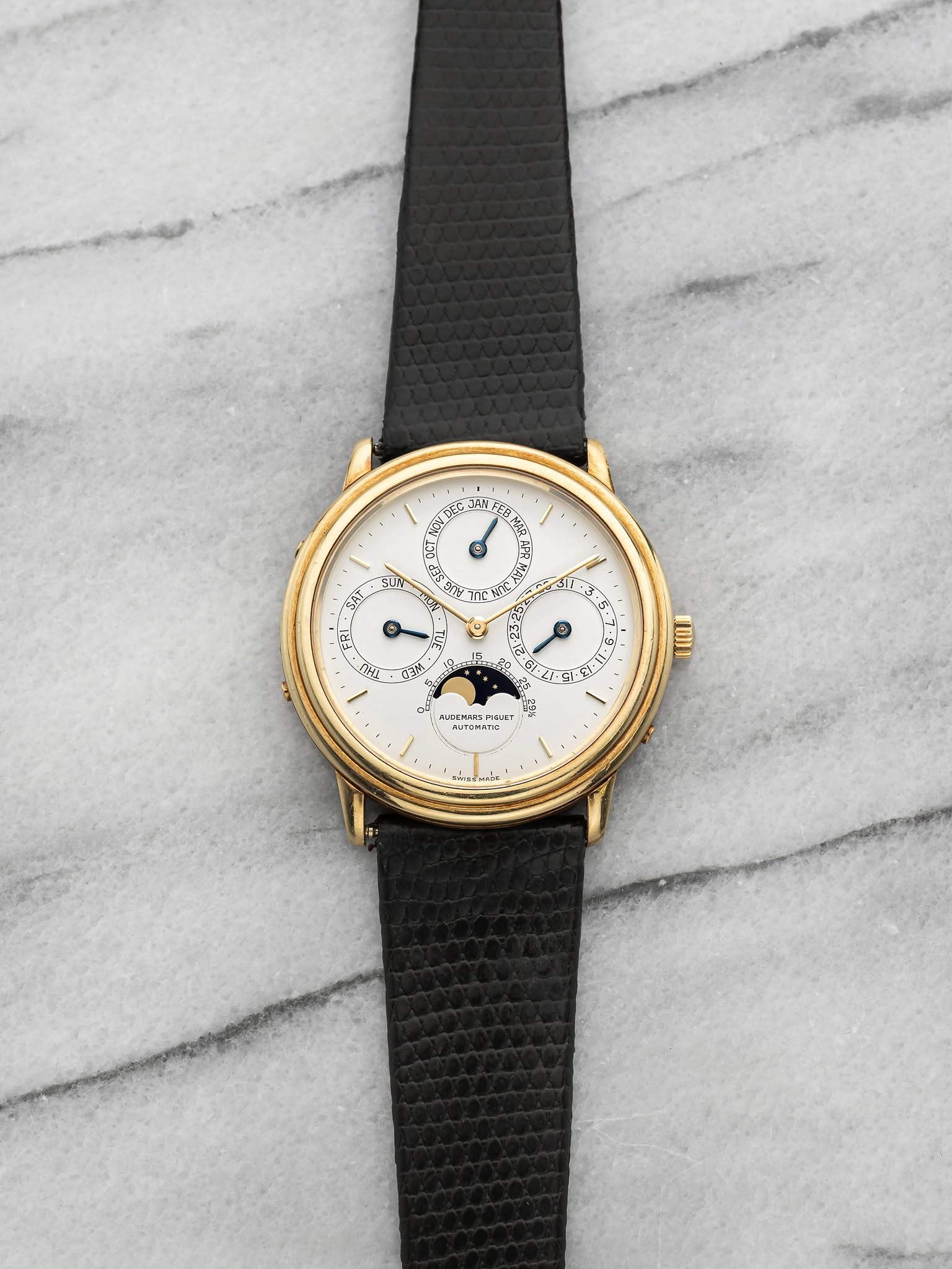 May be an image of wrist watch and text