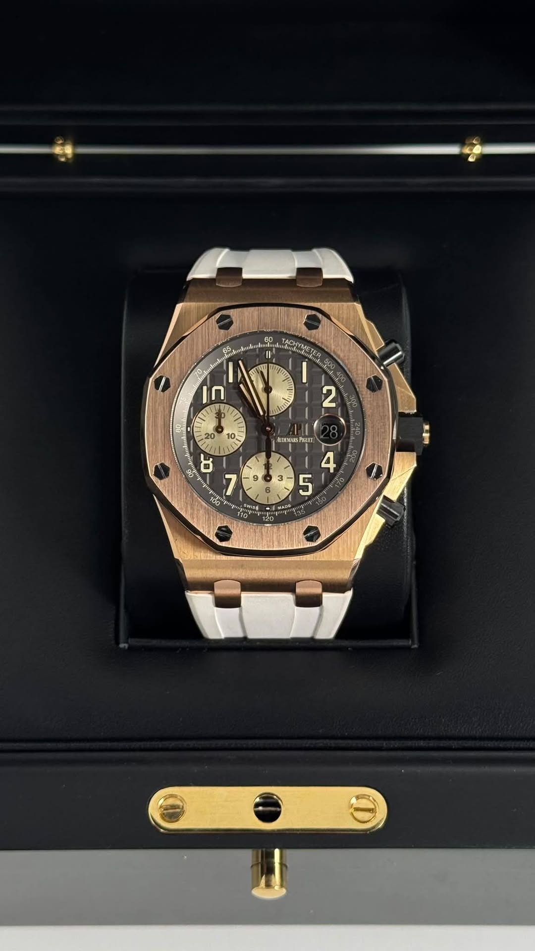 May be an image of wrist watch and text