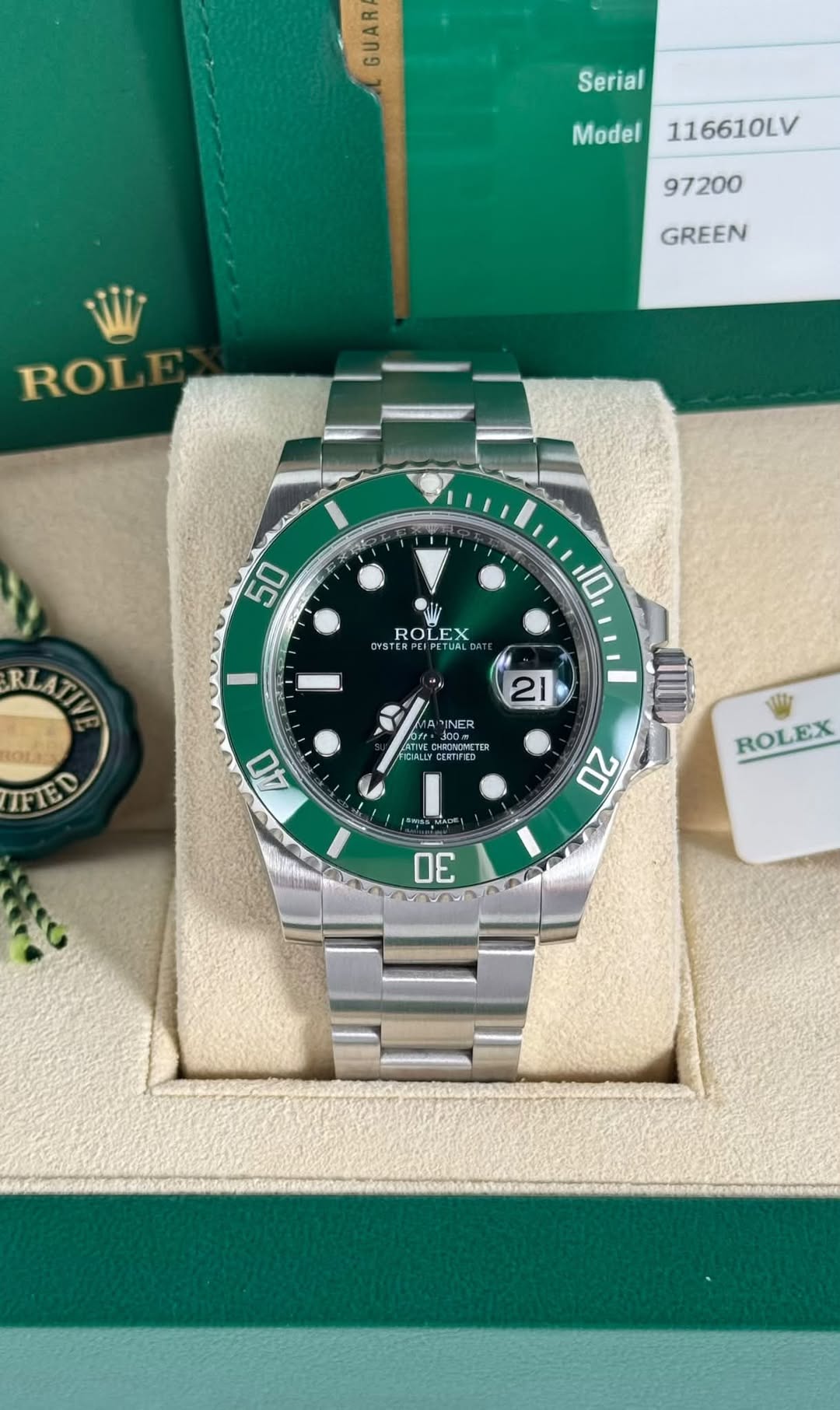 May be an image of wrist watch and text that says 'GUAR Serial 116610LV Model 97200 GREEN ROL 50 OYST TERPEIPETUAL ROLE 10 I 6 RLATIE KOLES IFIED 21 INER J00x TER FRGALLY CERTIIED…