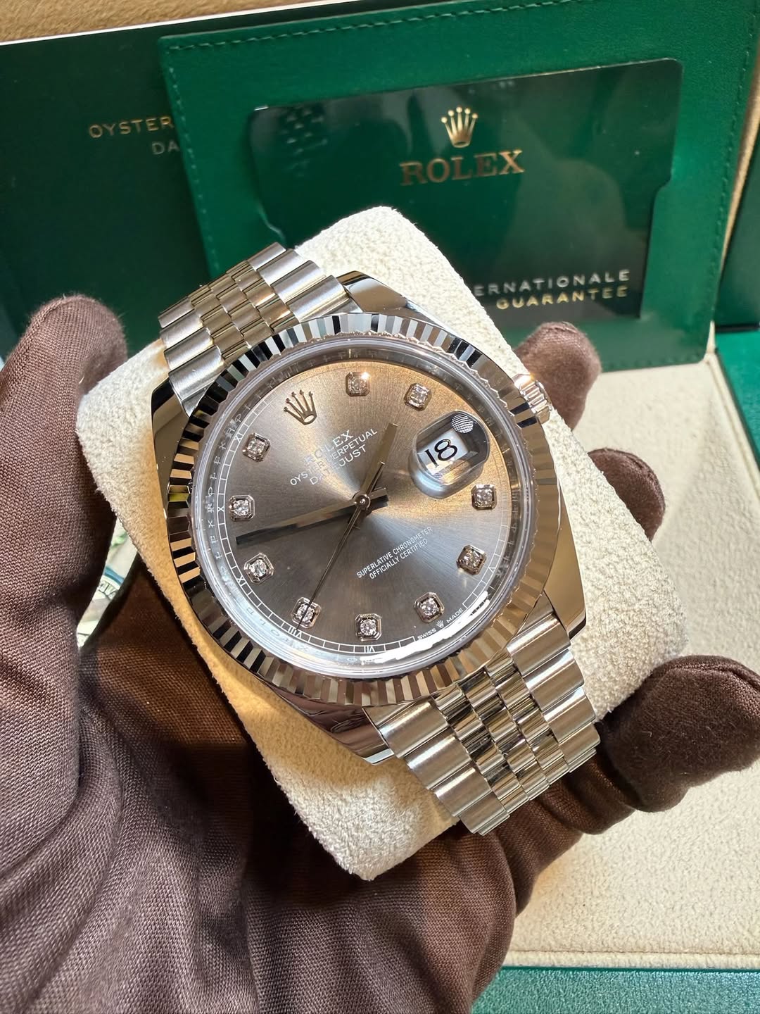 May be an image of wrist watch and text