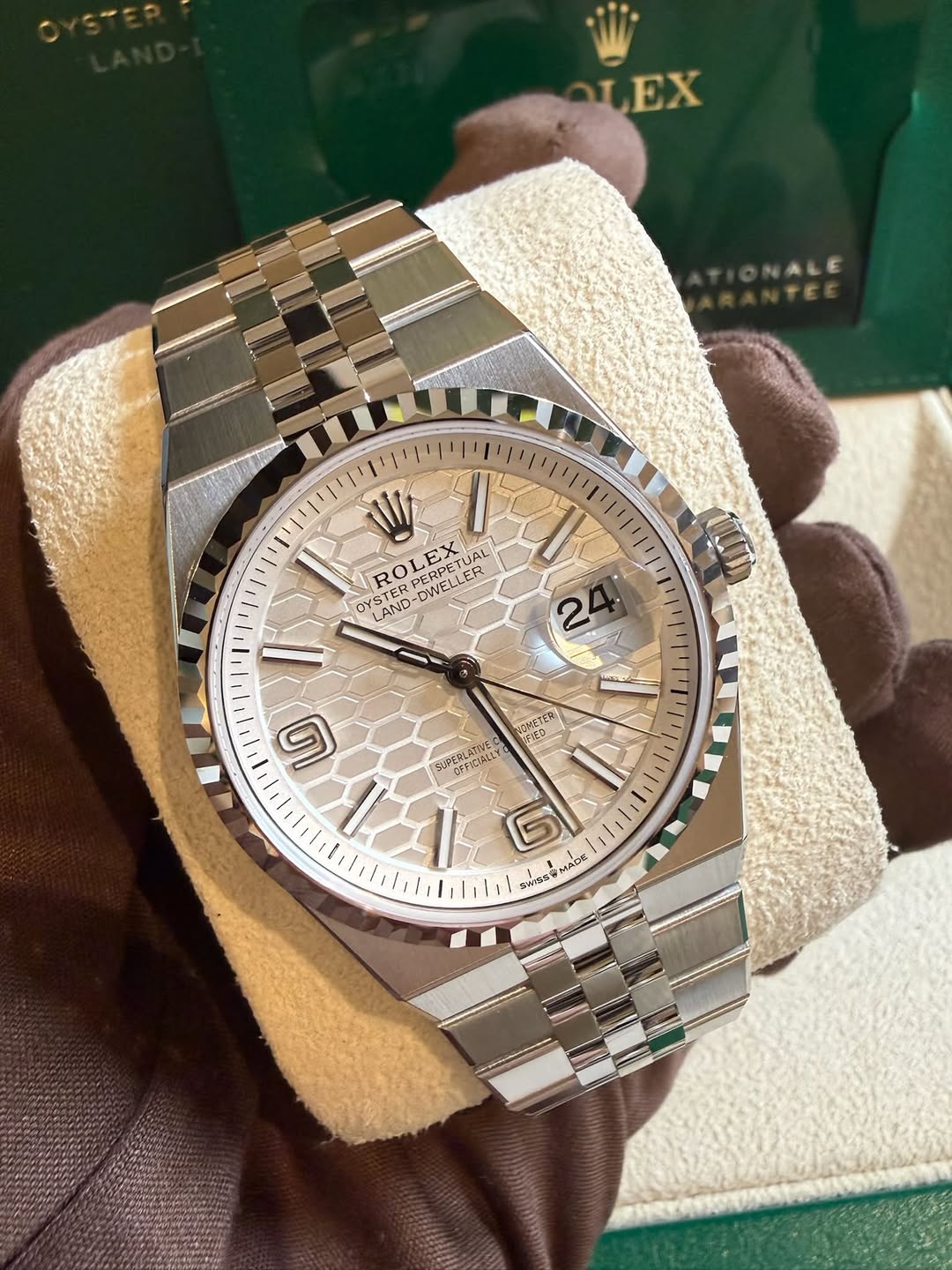 May be an image of wrist watch and text