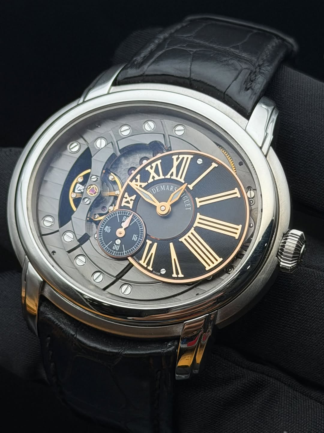 May be an image of wrist watch and text