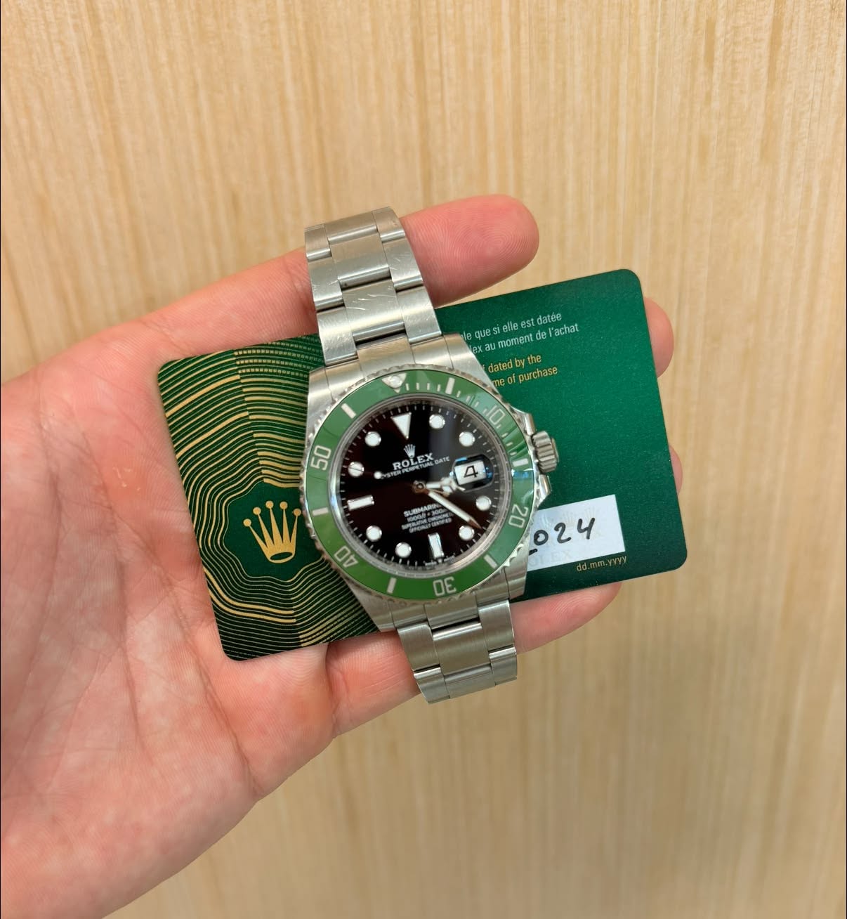 May be an image of wrist watch and text